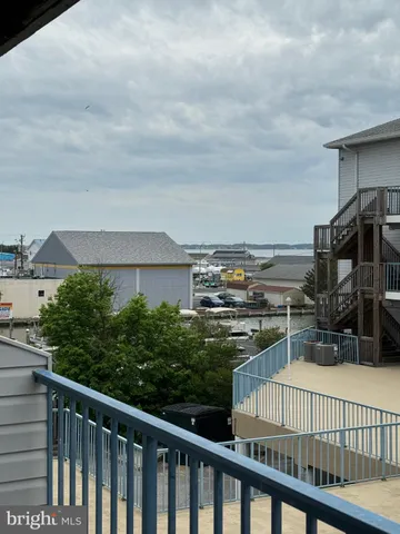 a view of a balcony with city view