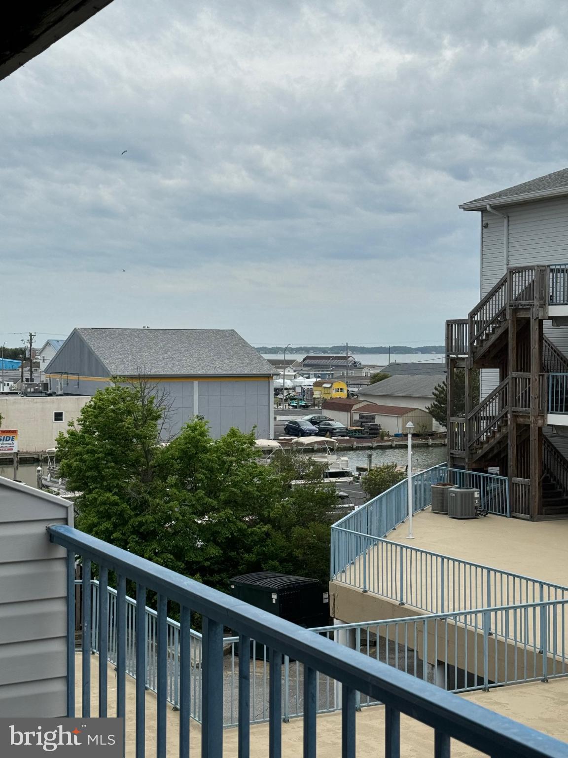a view of a balcony with city view