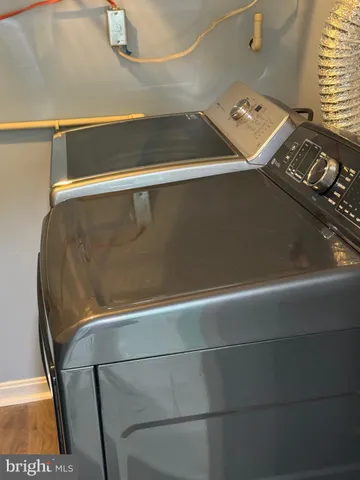 a bathroom with a shower and a bathtub