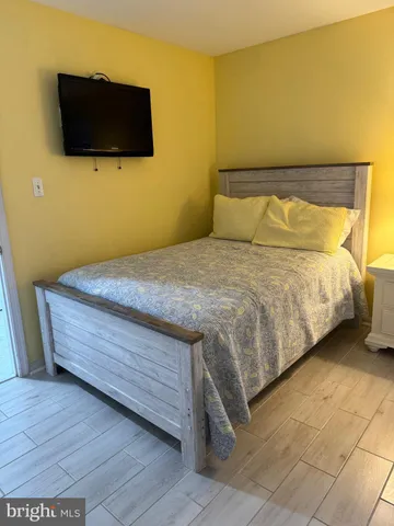 a kitchen with a sink cabinets and window