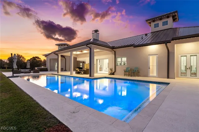 a view of a house with a swimming pool