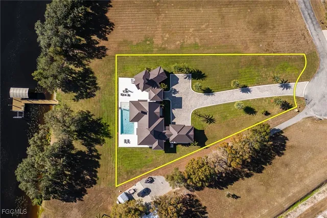 a view of swimming pool with a patio