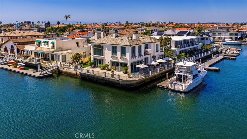3322 Devon Circle Huntington Beach, CA 92649 - Photo 1 of 1 a view of a lake with multiple house
