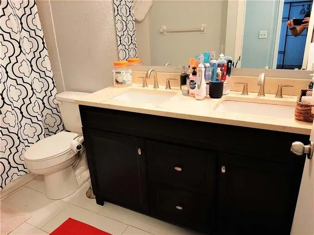 a bathroom with a sink and a toilet