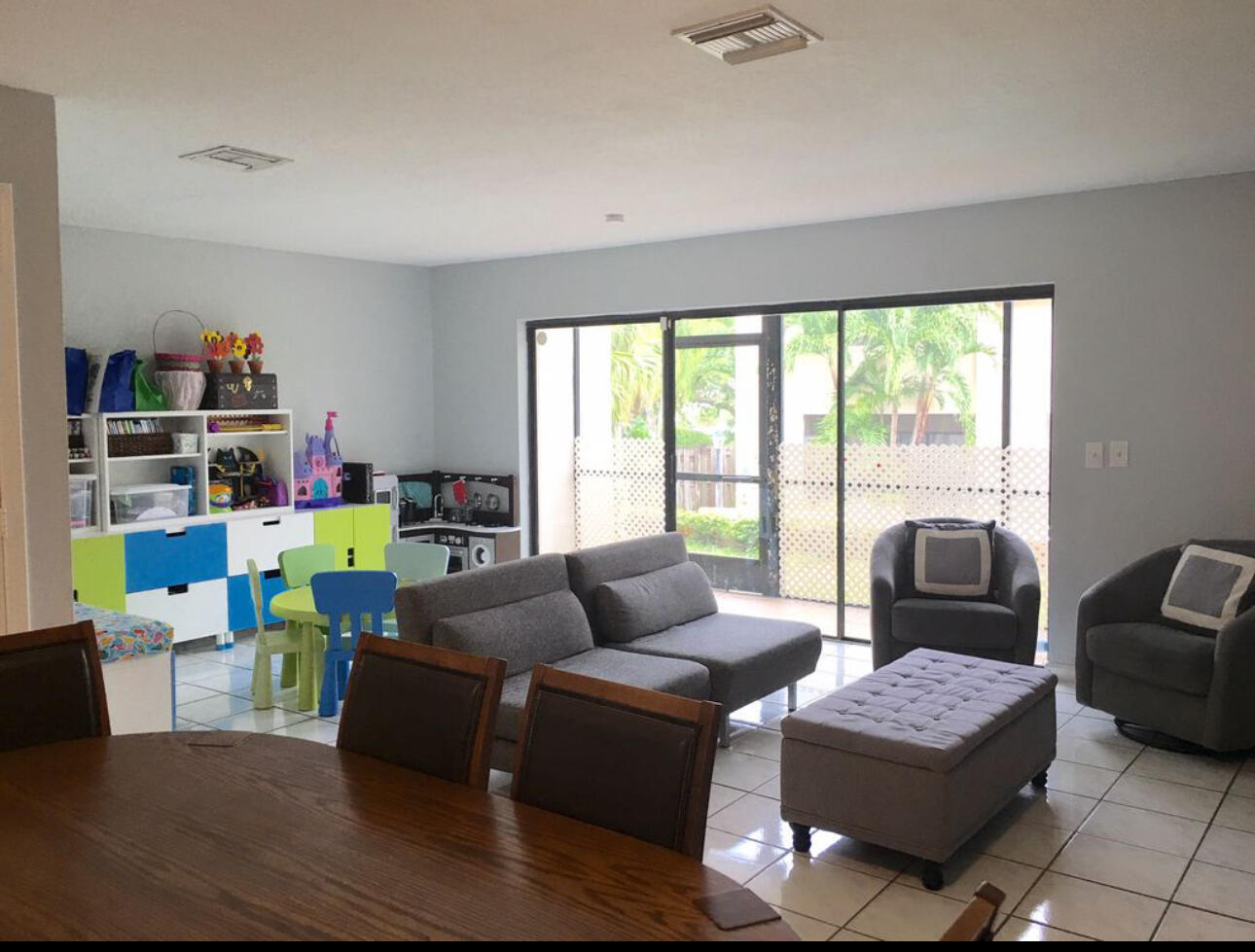 1679 Northwest 15th Vista Boca Raton, FL 33432 - Photo 4 of 15 a living room with furniture and a wooden floor