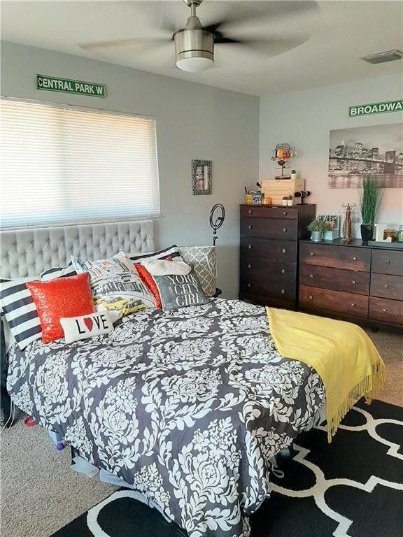 1679 Northwest 15th Vista Boca Raton, FL 33432 - Photo 10 of 15 a bedroom with a bed and a dresser in it