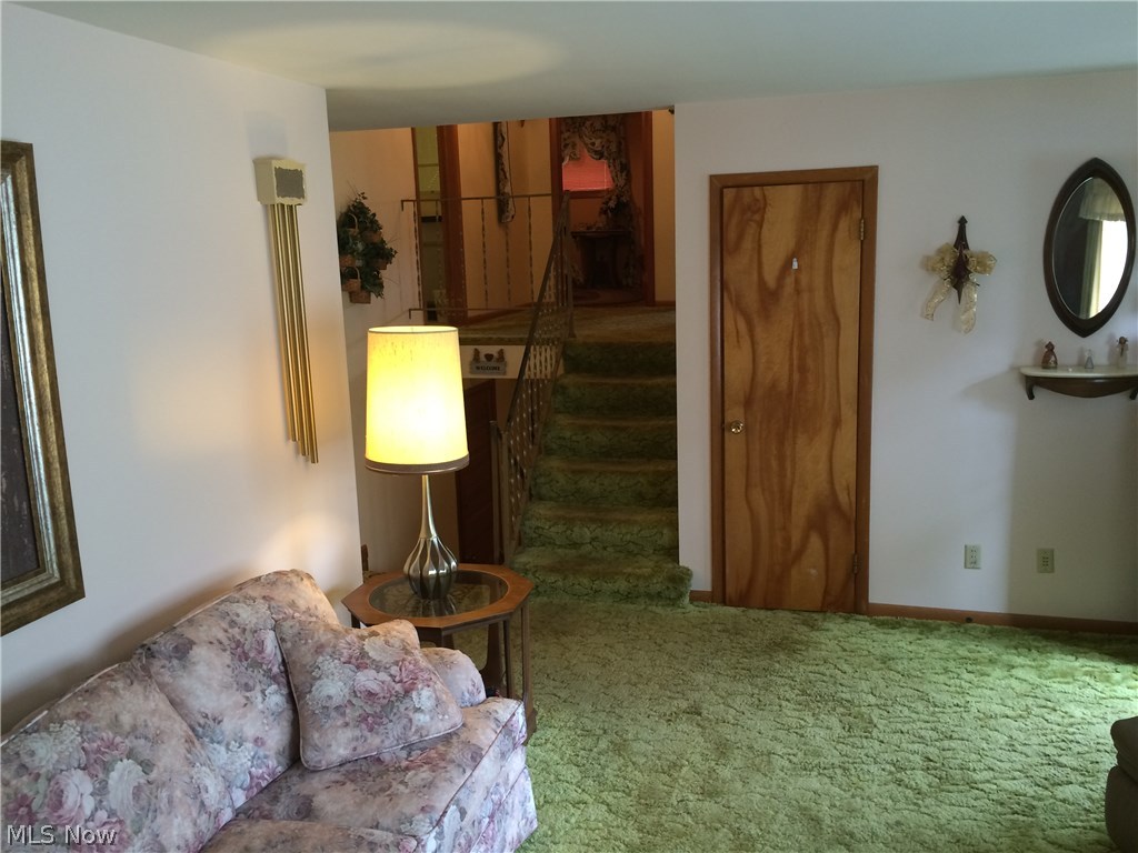 3629 Longfield Road Ravenna, OH 44266 - Photo 4 of 19 Living room leads upper level.