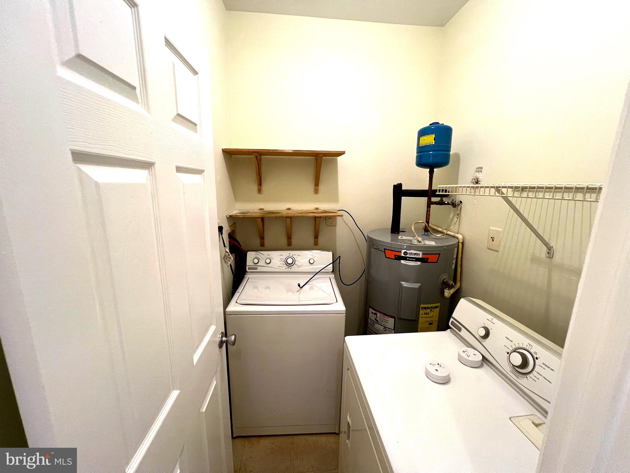 604 Moonglow Road, Unit 102 Odenton, MD 21113 - Photo 13 of 27 Efficient laundry space for modern living.