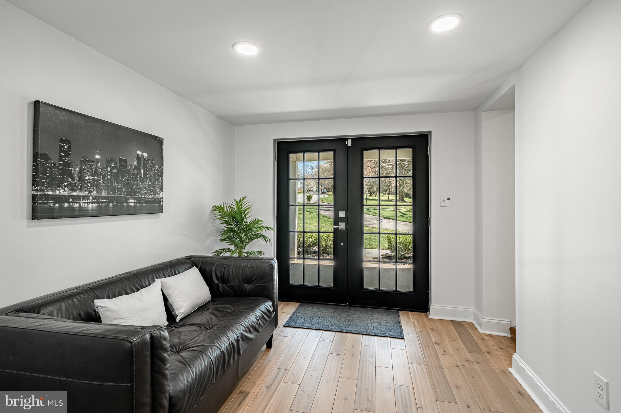 466 Barclay Road Bryn Mawr, PA 19010 - Photo 11 of 62 a living room with furniture and a wooden floor