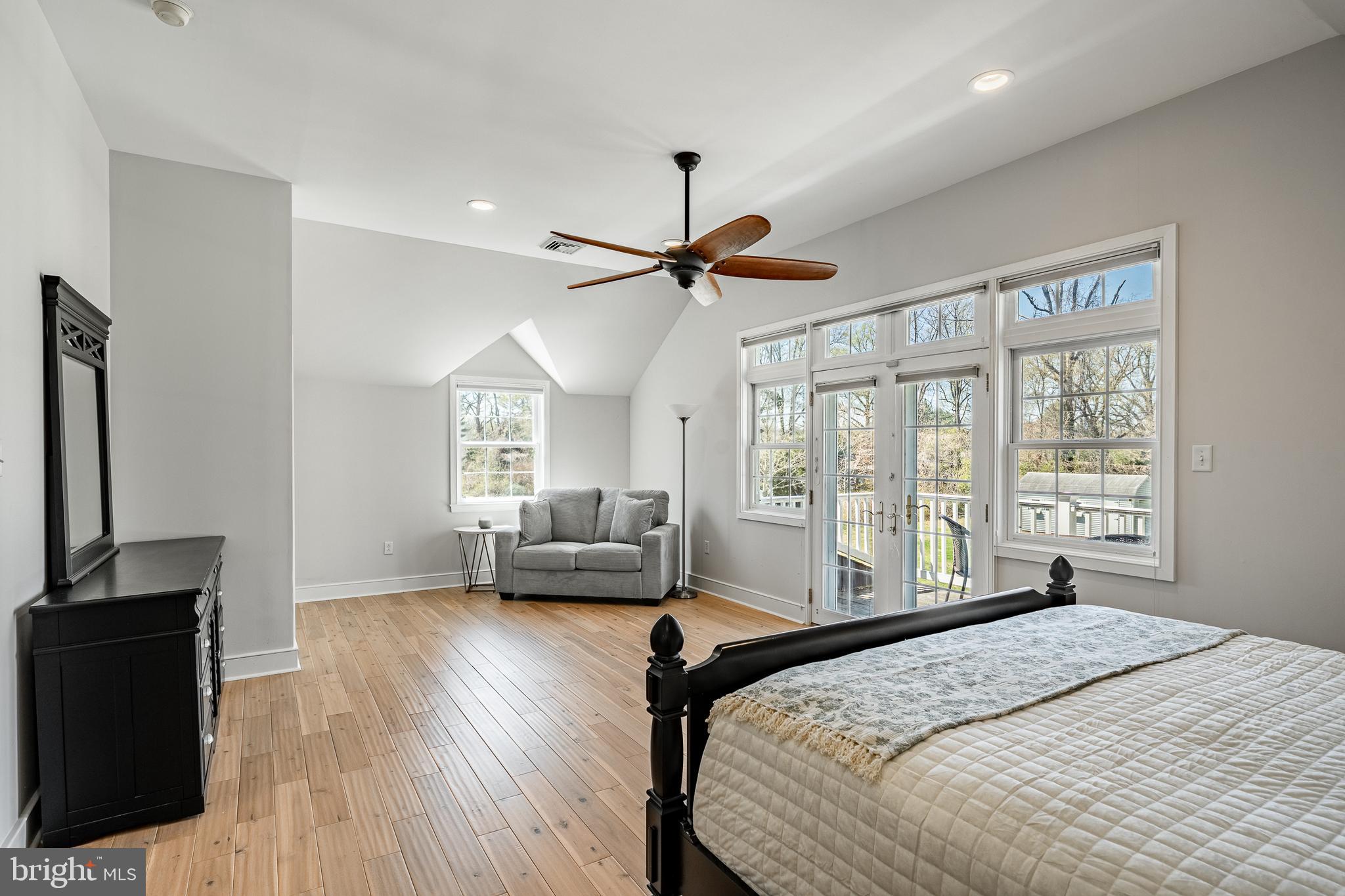 466 Barclay Road Bryn Mawr, PA 19010 - Photo 29 of 62 a bedroom with a bed window and a flat screen tv
