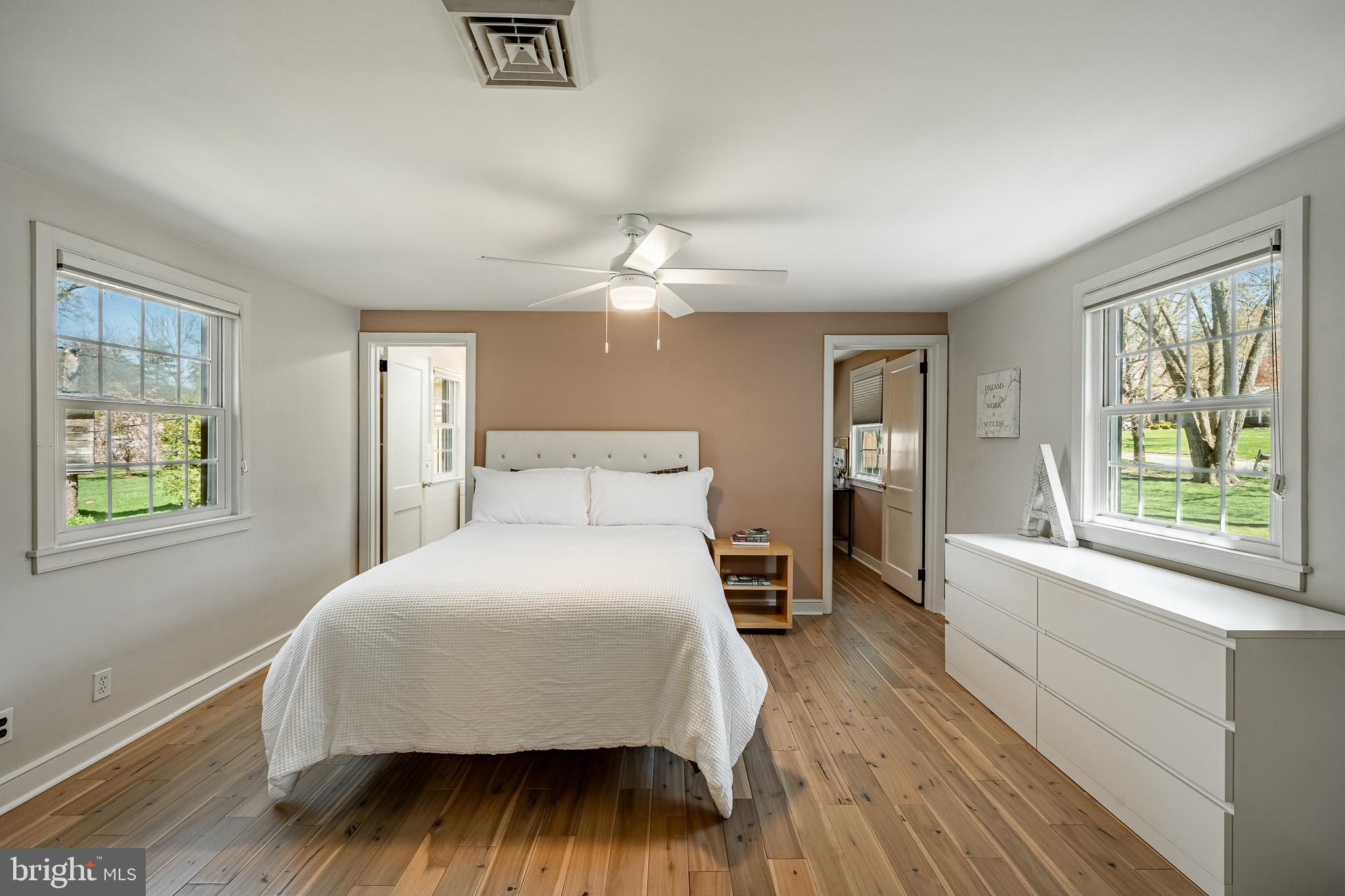 466 Barclay Road Bryn Mawr, PA 19010 - Photo 36 of 62 a bedroom with a large bed and a large window