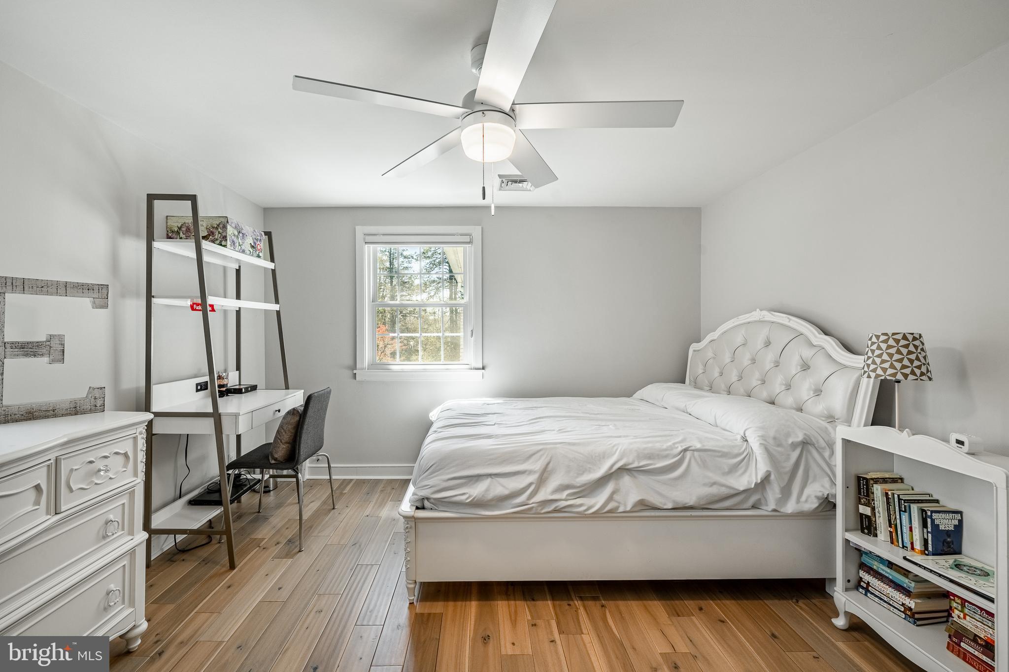466 Barclay Road Bryn Mawr, PA 19010 - Photo 40 of 62 a bedroom with a bed and a table in it