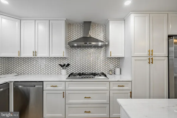 a bedroom with a large bed and a large window