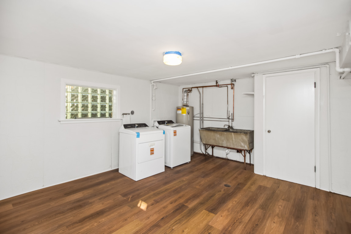 1808 Laurel Avenue Evanston, IL 60201 - Photo 12 of 15 a room with a wooden floor and a sink