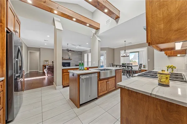 a kitchen with counter top space and appliances