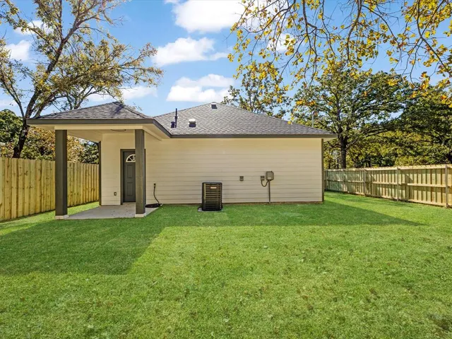 a view of a backyard with a garden