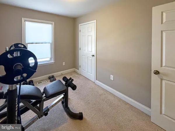 a room with furniture and window
