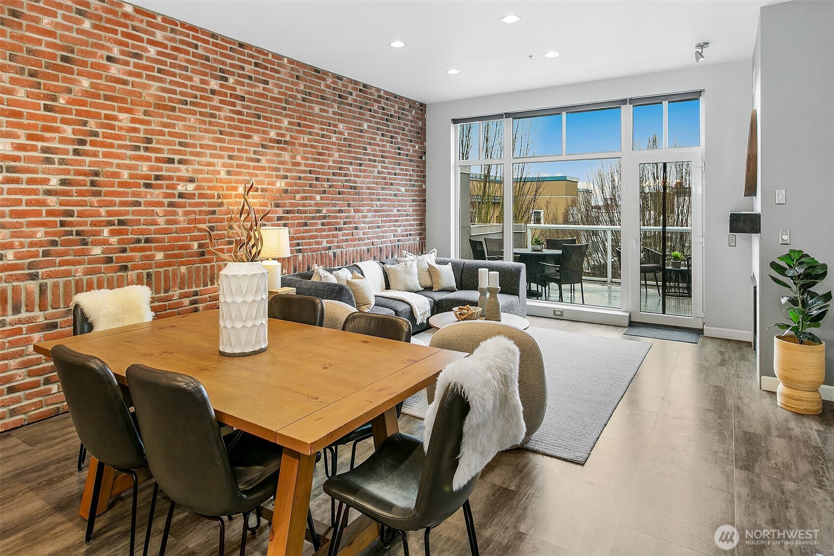 17 West Mercer Street, Unit 302 Seattle, WA 98119 - Photo 4 of 28 a view of a dining room with furniture