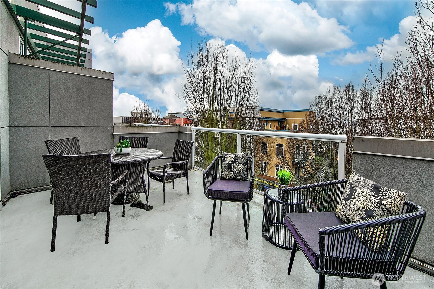 17 West Mercer Street, Unit 302 Seattle, WA 98119 - Photo 7 of 28 a view of a chairs and table in the terrace