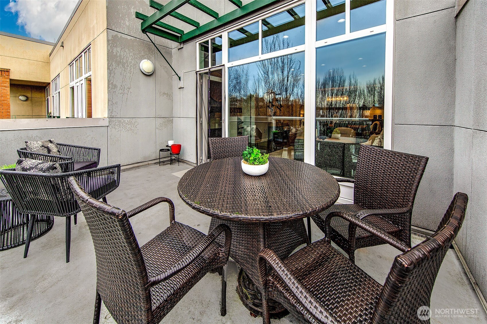 17 West Mercer Street, Unit 302 Seattle, WA 98119 - Photo 9 of 28 a view of a chairs and table in the balcony