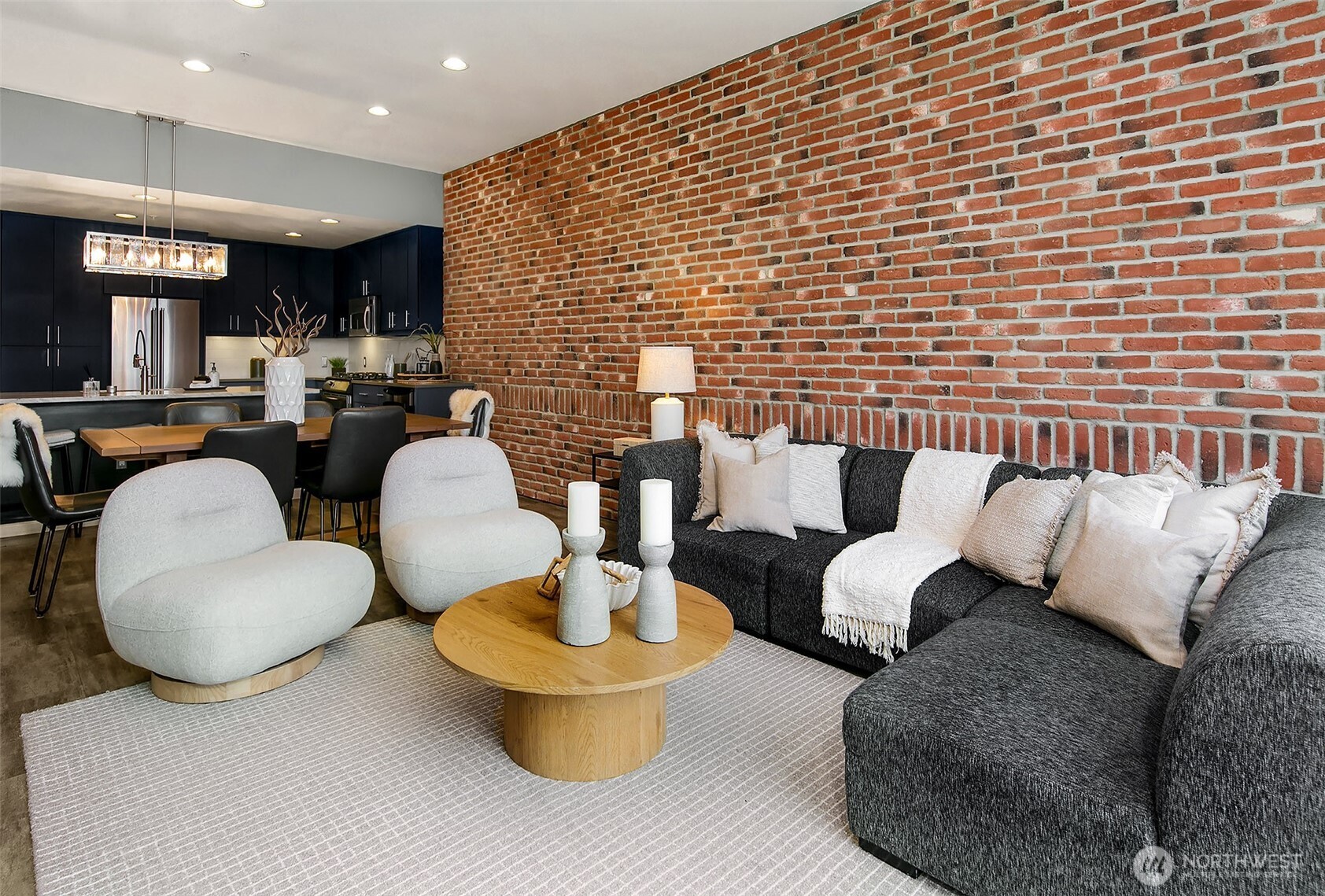 17 West Mercer Street, Unit 302 Seattle, WA 98119 - Photo 10 of 28 a living room with furniture and a large window