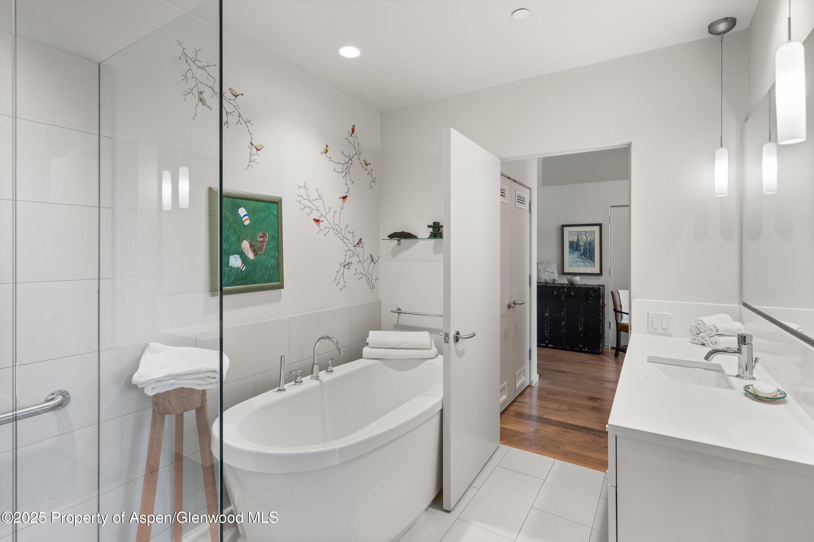 202 Evans Road, Unit 202 Basalt, CO 81621 - Photo 13 of 29 a bathroom with a sink a toilet and shower