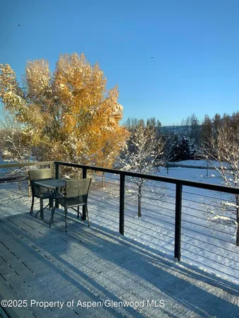 a view of a lake with a yard