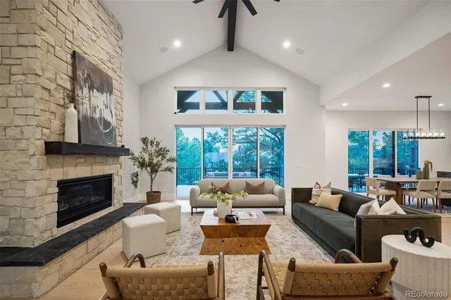 a large kitchen with a table and chairs