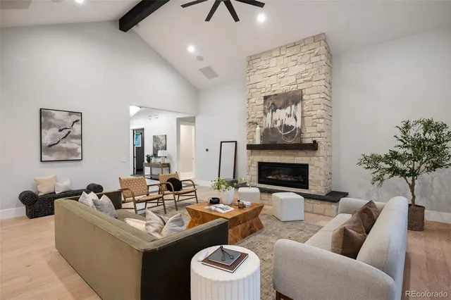 a kitchen with stainless steel appliances a sink stove and cabinets