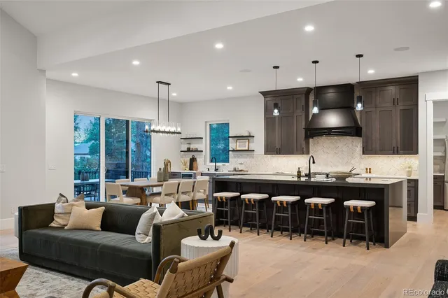 a view of cabinets with stainless steel appliances granite countertop cabinets and window