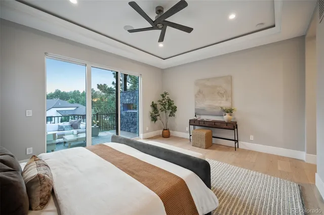 a living room with furniture and view of kitchen