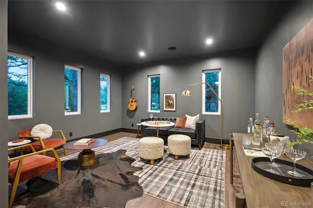 a bathroom with a sink toilet a mirror and shower