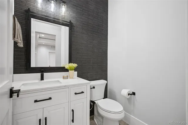 a view of balcony with furniture