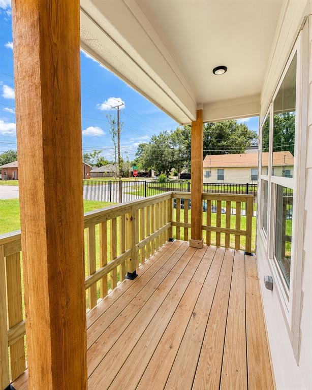 3529 Cleveland Street Dallas, TX 75215 - Photo 5 of 5 a view of balcony with wooden floor