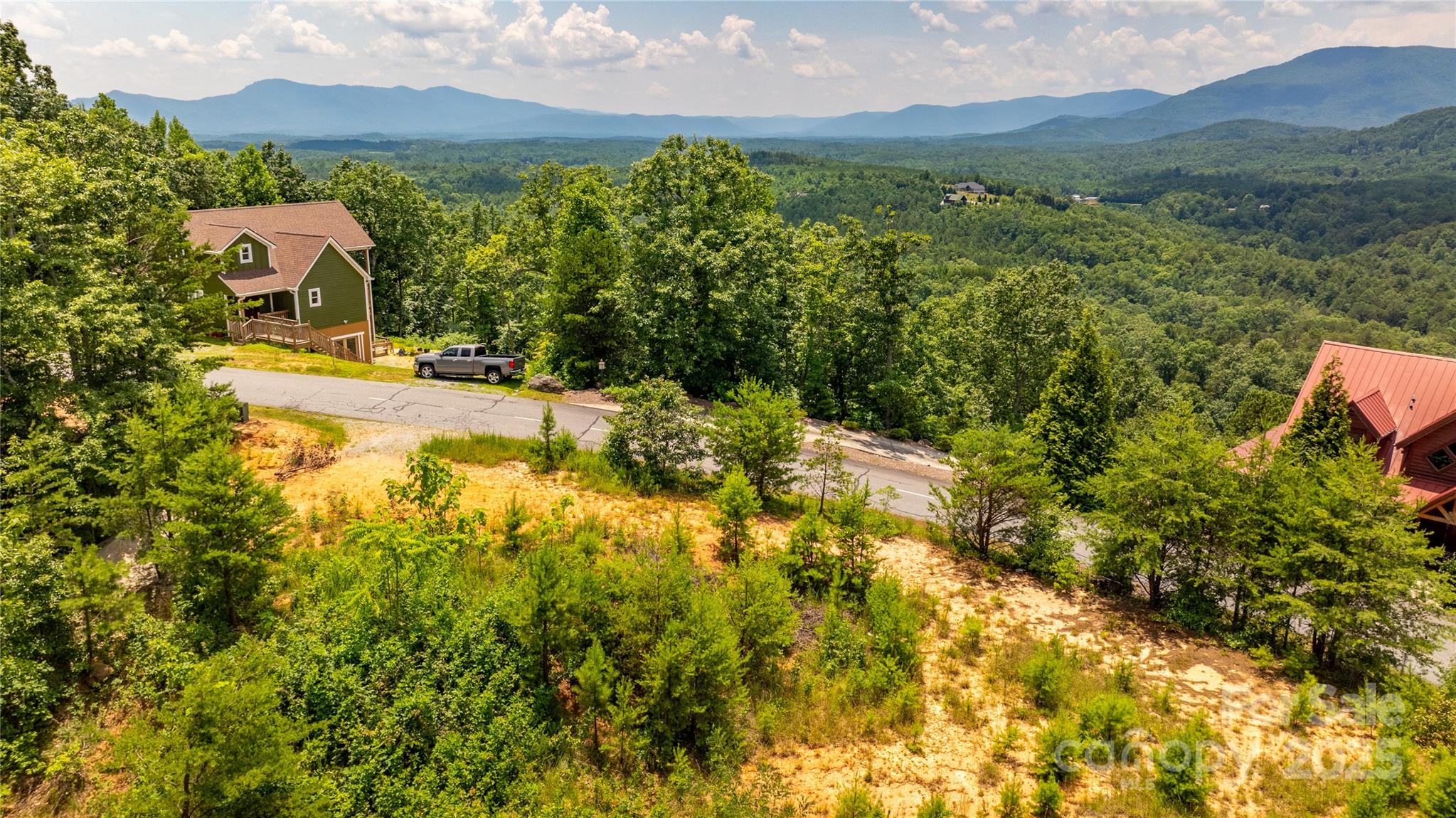 240 Boulder Ridge Lake Lure, NC 28746 - Photo 18 of 28 a view of a lake with a mountain