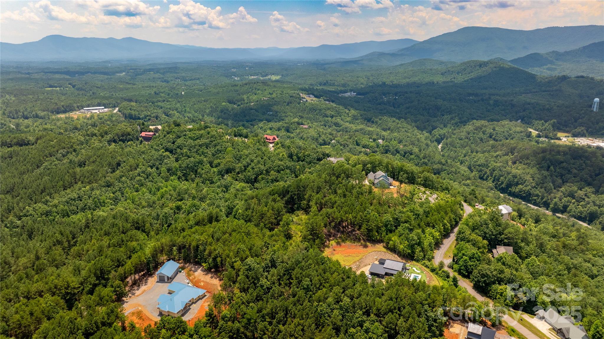 240 Boulder Ridge Lake Lure, NC 28746 - Photo 20 of 28 a view of a lush green hillside and covered with trees