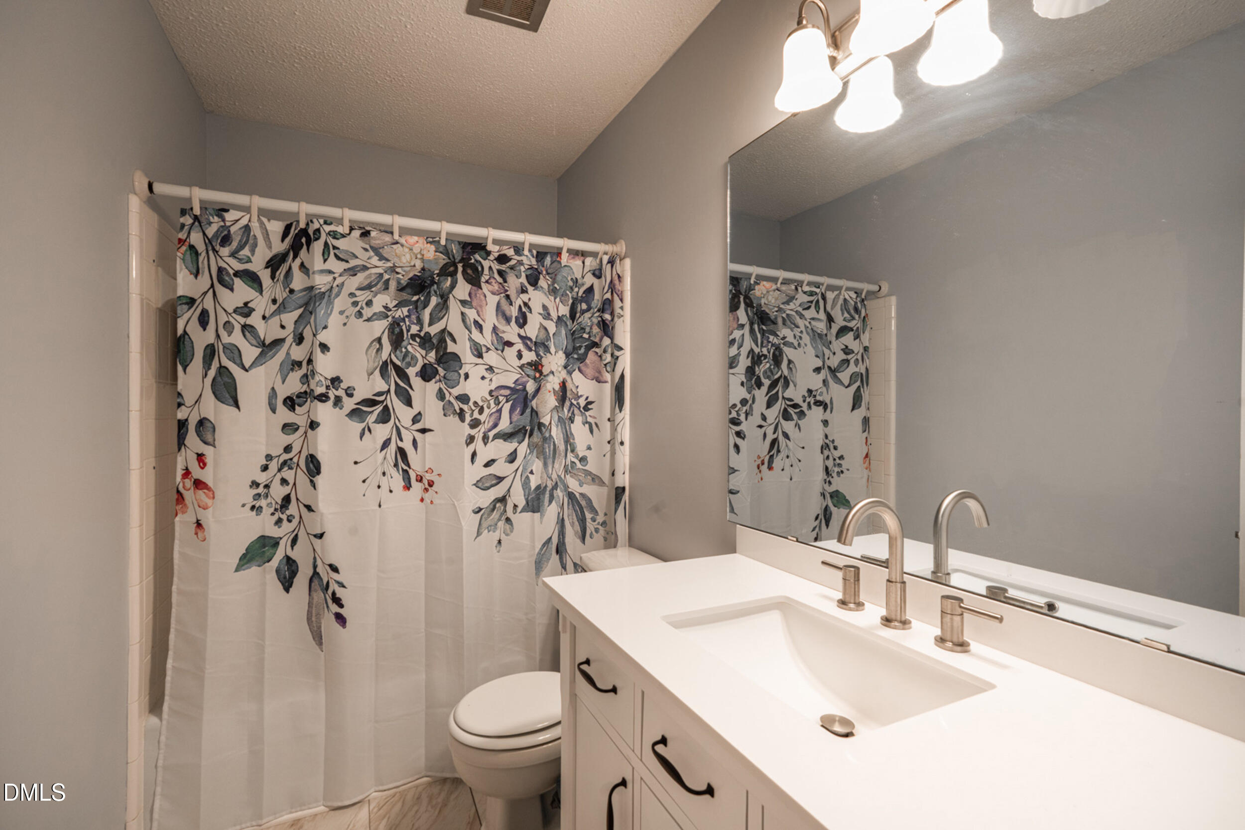 1008 East Millbrook Road Raleigh, NC 27609 - Photo 16 of 28 16_Main_Hall_Bath