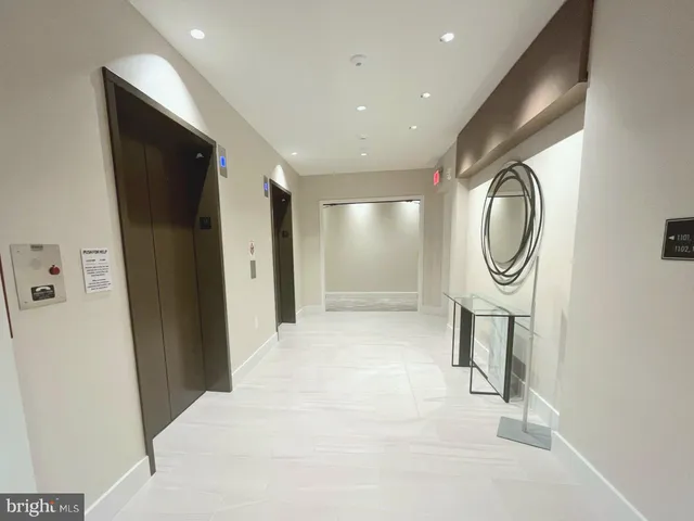 a view of a hallway with elevator