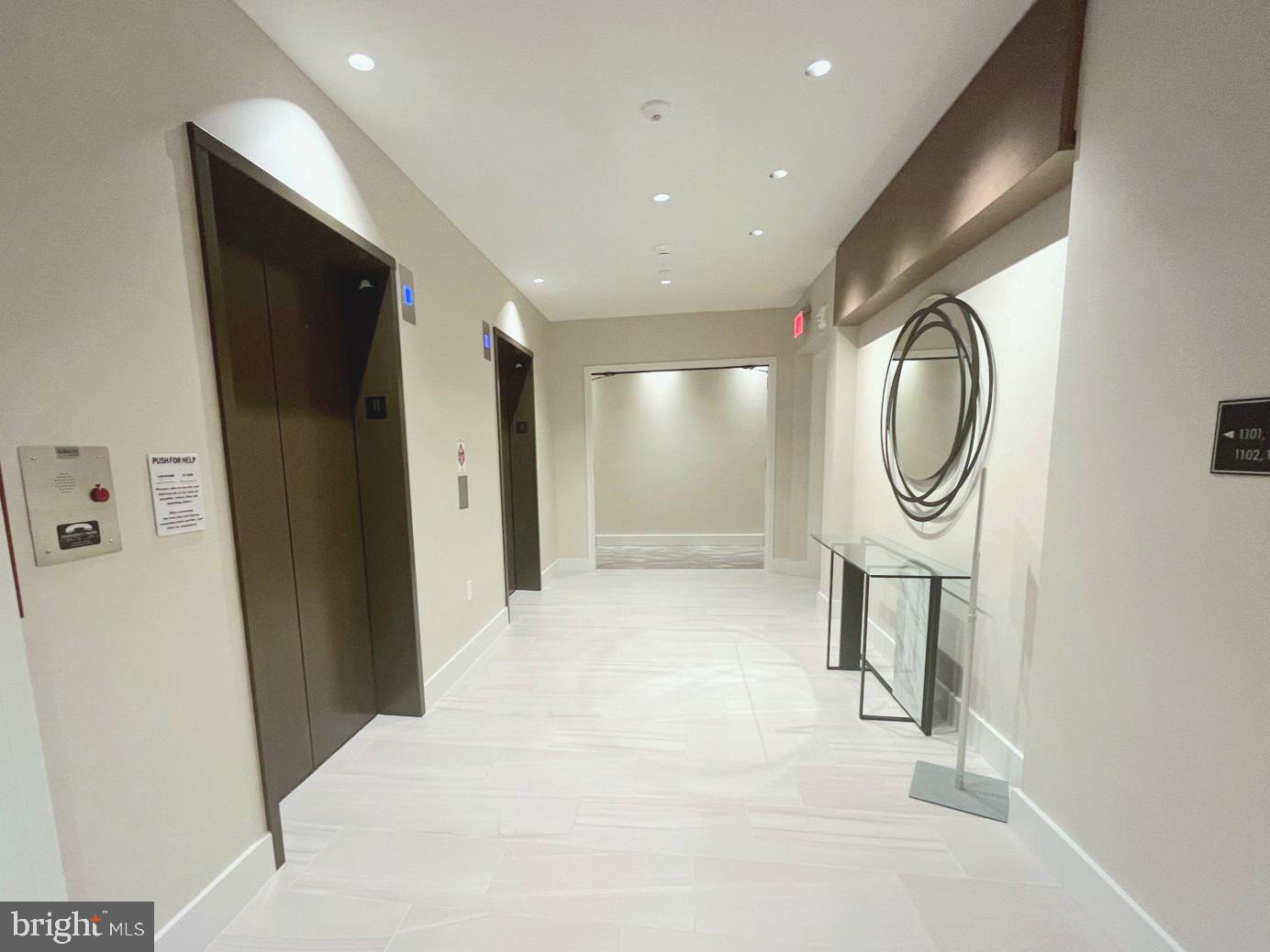 7887 Jones Branch Drive, Unit 1104 McLean, VA 22102 - Photo 15 of 42 a view of a hallway with elevator