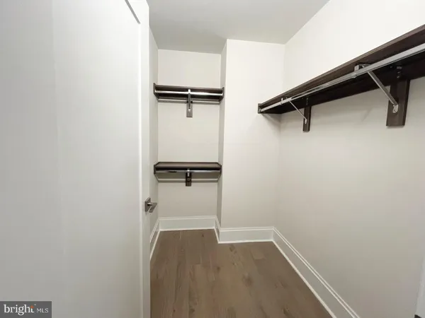 a view of a room with racks on the wall