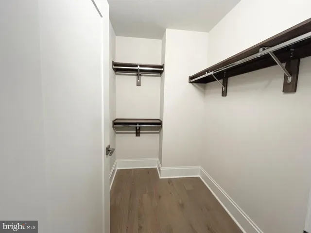 a view of a room with racks on the wall