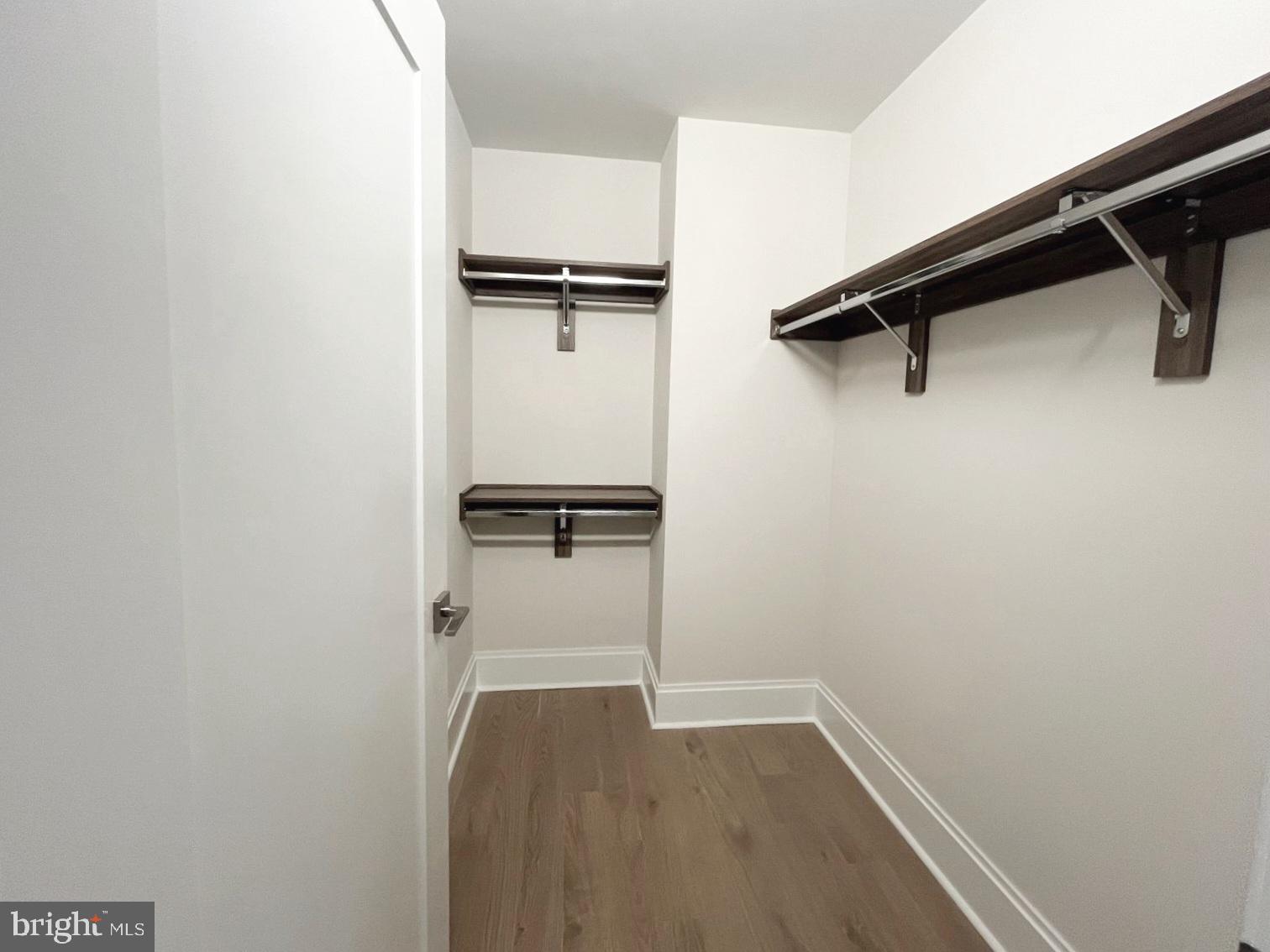 7887 Jones Branch Drive, Unit 1104 McLean, VA 22102 - Photo 23 of 42 a view of a room with racks on the wall