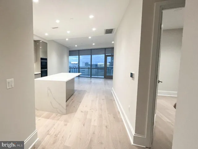 a view of a kitchen and a sink