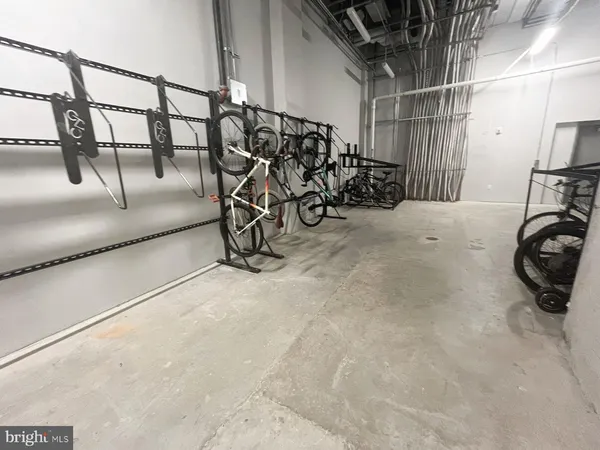 a view of a bike garage with furniture