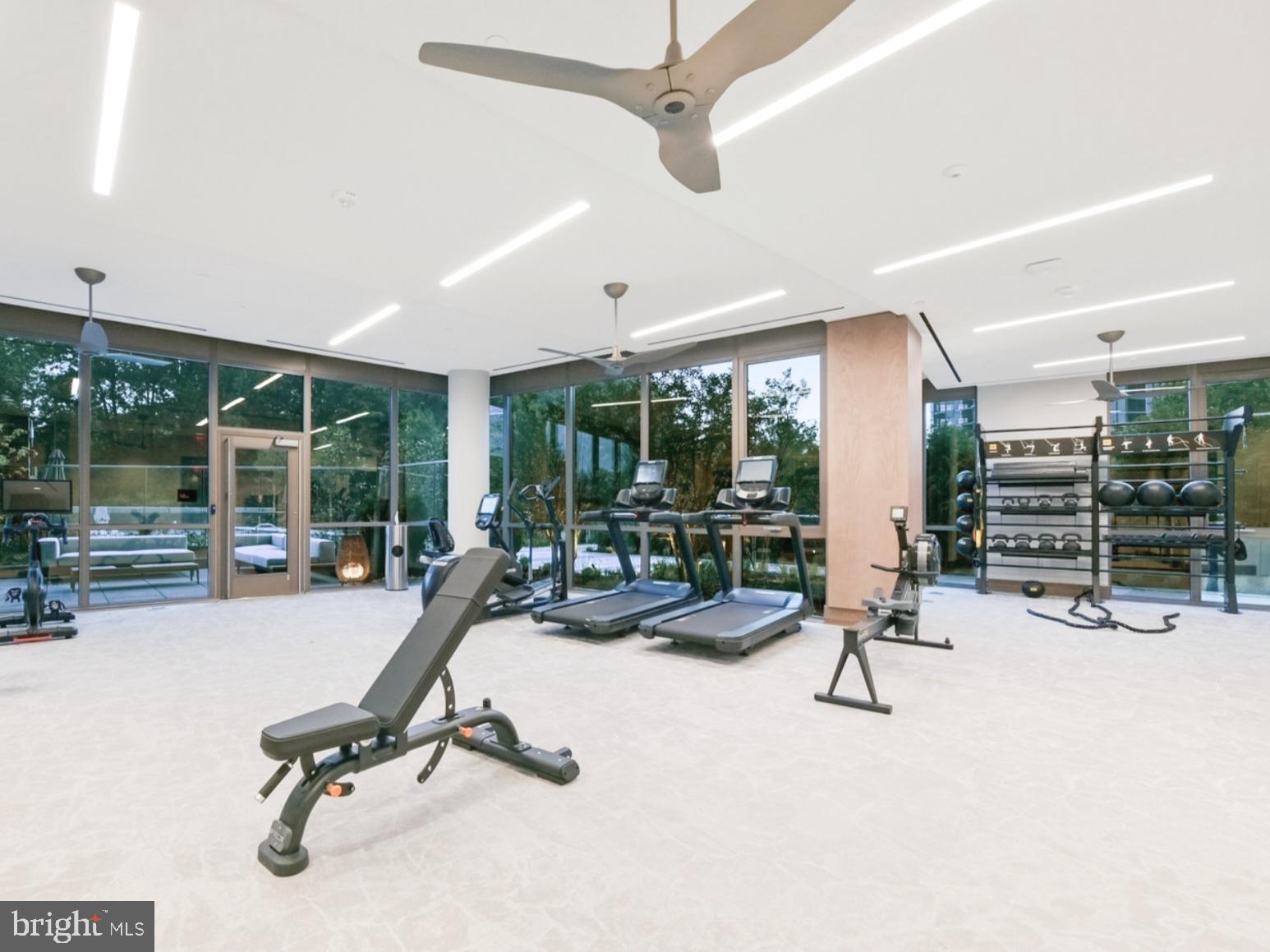 7887 Jones Branch Drive, Unit 1104 McLean, VA 22102 - Photo 40 of 42 a view of a gym with gym equipment