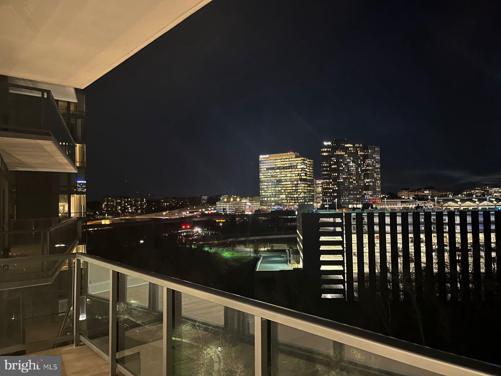 7887 Jones Branch Drive, Unit 1104 McLean, VA 22102 - Photo 10 of 42 a view of swimming pool from a balcony