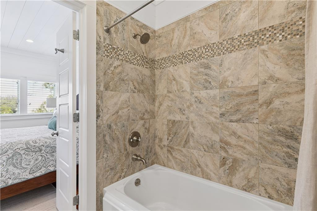 4316 5th Street St. Simons Island, GA 31522 - Photo 34 of 58 Upstairs bedroom bathroom shower