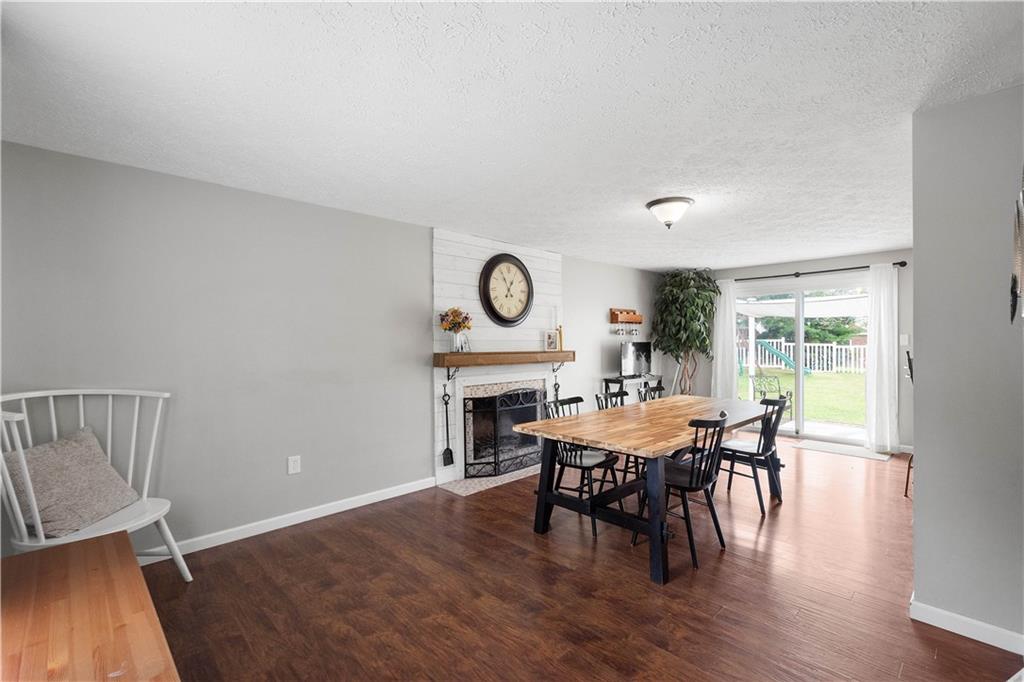 201 Arcola Drive Coraopolis, PA 15108 - Photo 16 of 33 a view of a dining room with furniture window and wooden floor