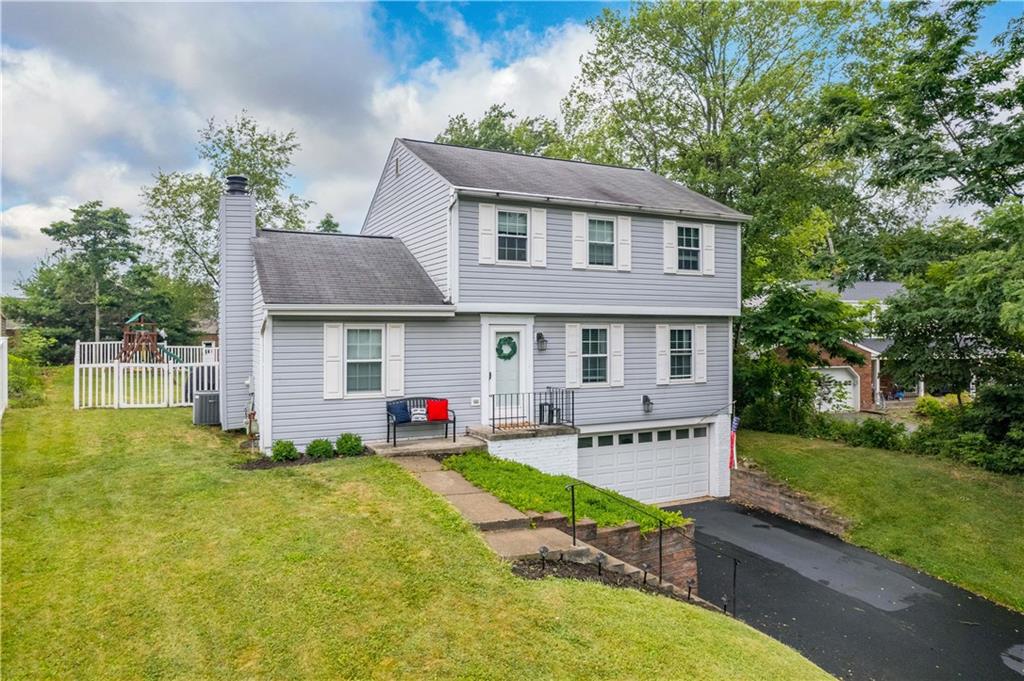 201 Arcola Drive Coraopolis, PA 15108 - Photo 2 of 33 a view of a house with a yard porch and sitting area