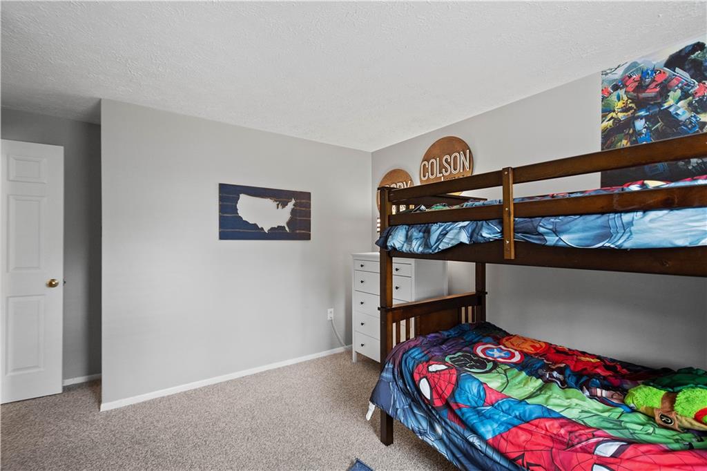 201 Arcola Drive Coraopolis, PA 15108 - Photo 22 of 33 a bedroom with bed and a window